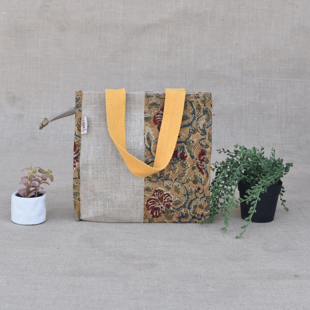 Yellow kalamkari and jute lunch bag