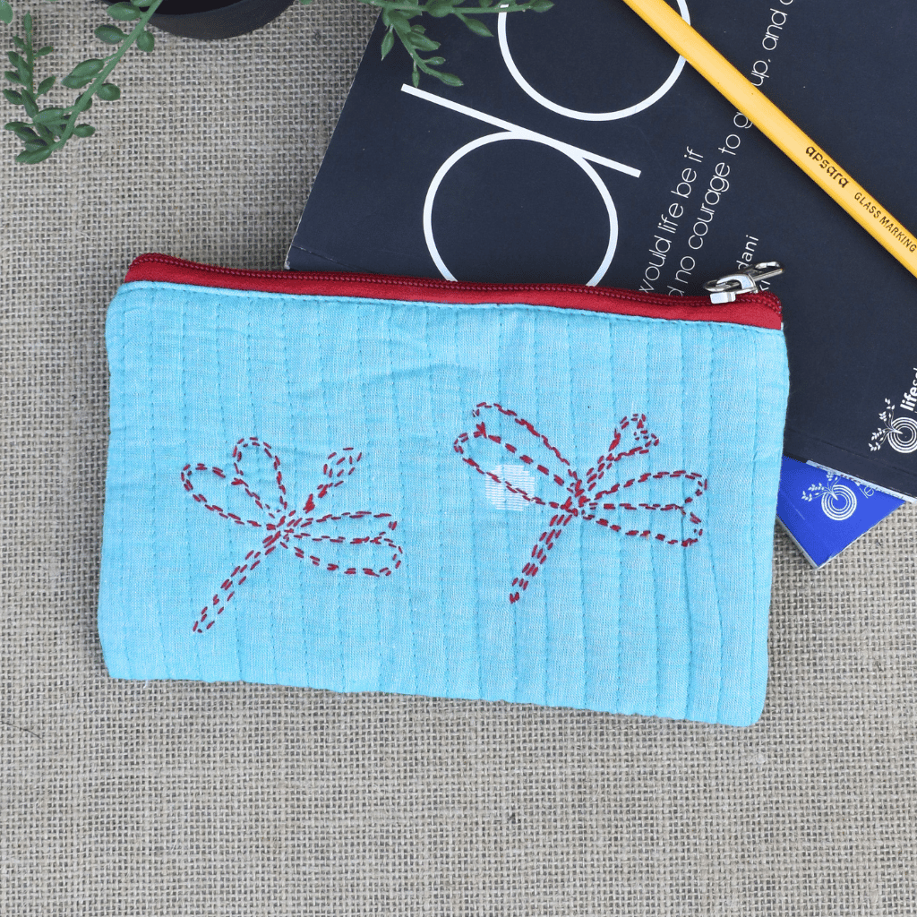 Light blue hand embroidered pouch - front
