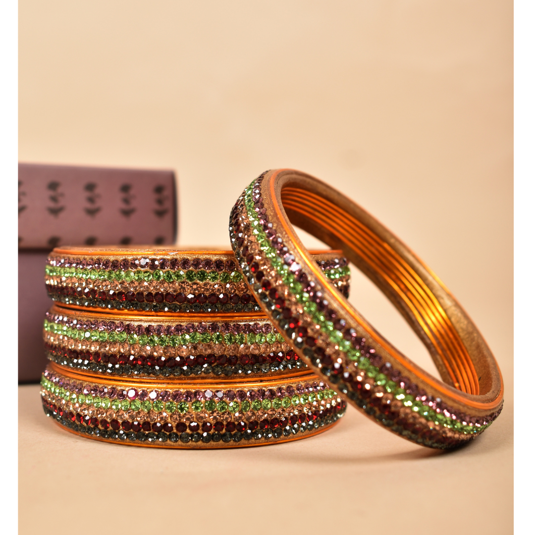 Pair of bangles in multi colour brown and gold lines