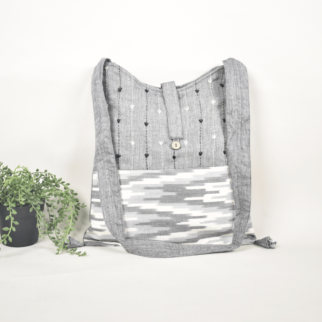 Grey Ikat sling bag with hand embroidery - front