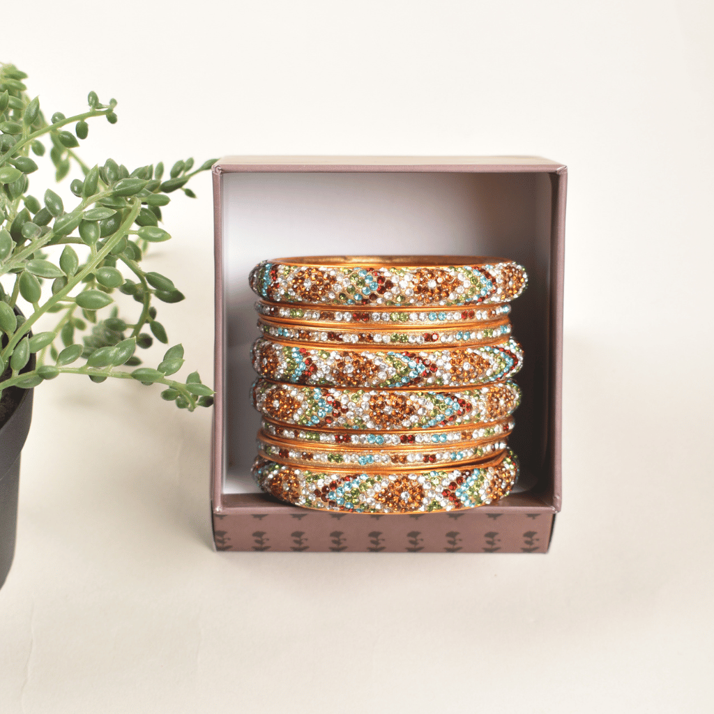 Set of lac bangles in orange & white stones