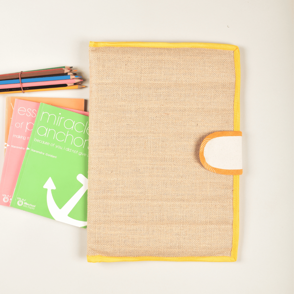 Simple natural jute file folder with a velcro tab and yellow piping - front