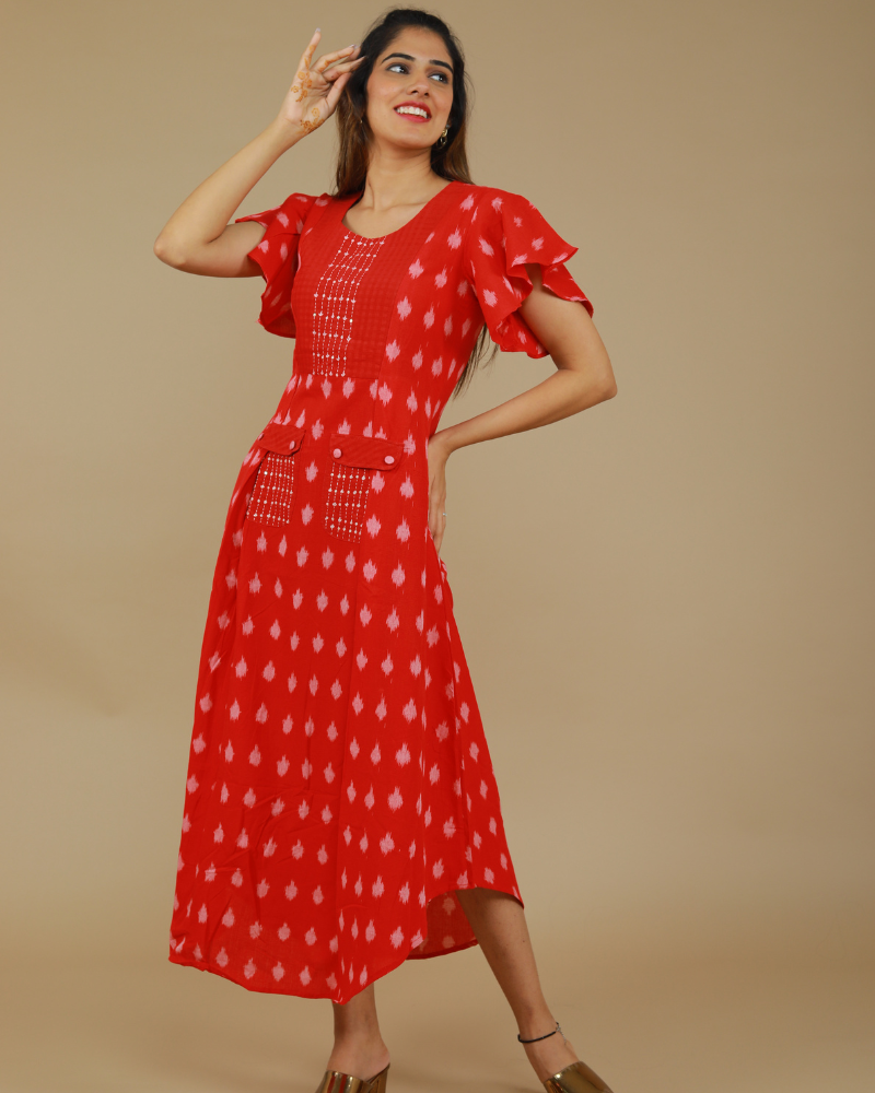 RED IKAT PLEATED DRESS WITH HAND EMBROIDERED POCKETS AND YOKE