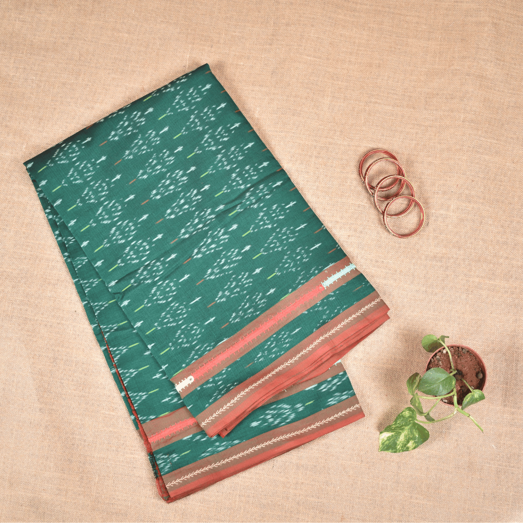Green ikat saree with hand embroidery