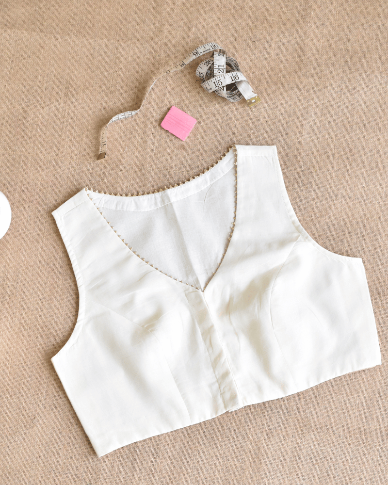 Sleeveless Off-white Blouse with Zari Border