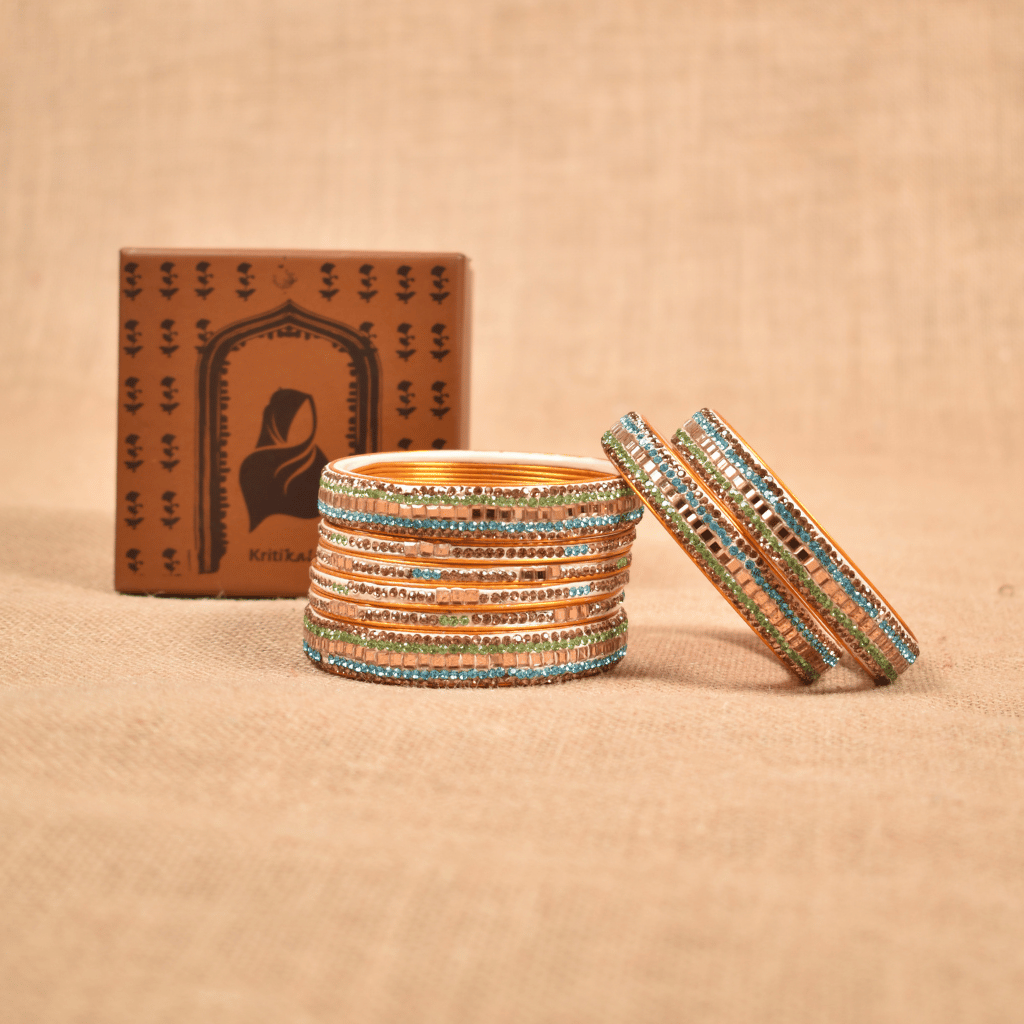 Set of eight bangles in gold & blue tones