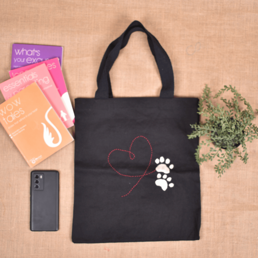 Black Canvas Tote Bag with Embroidered Paw & Heart Design - front