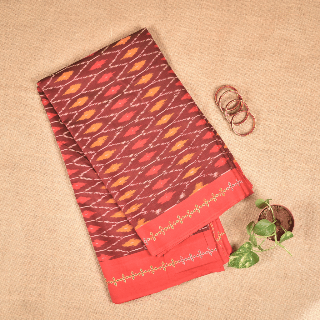 Maroon ikat saree with hand embroidery