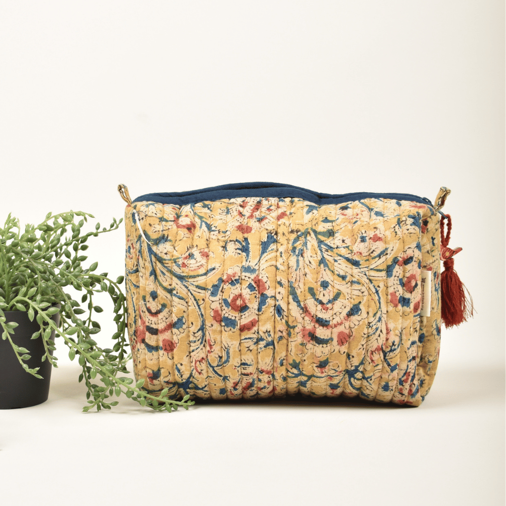 Yellow kalamkari travel pouch - front