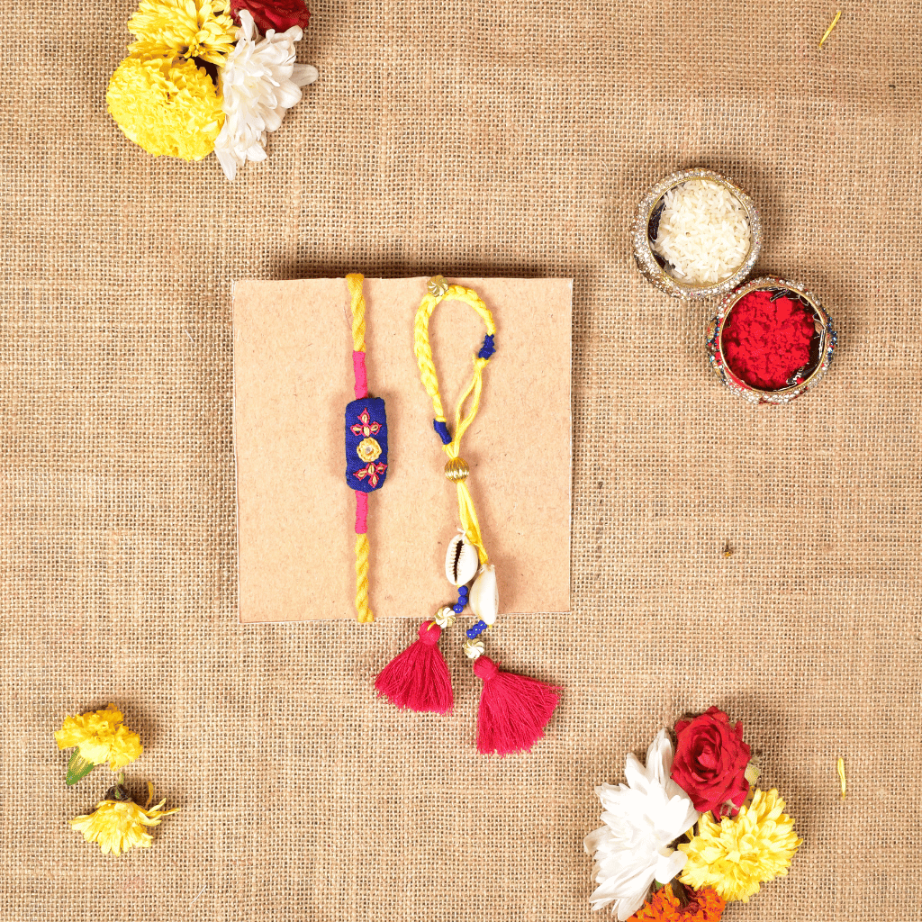 Handcrafted Bhai Bhabhi Rakhi Set with Cotton Potli, Kumkum & Rice - Blue