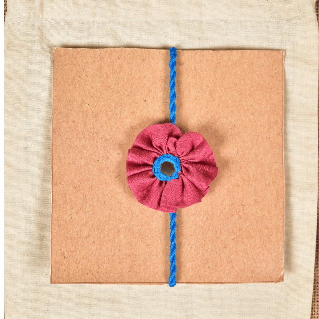 Pink Flower Embroidery Handloom Rakhi