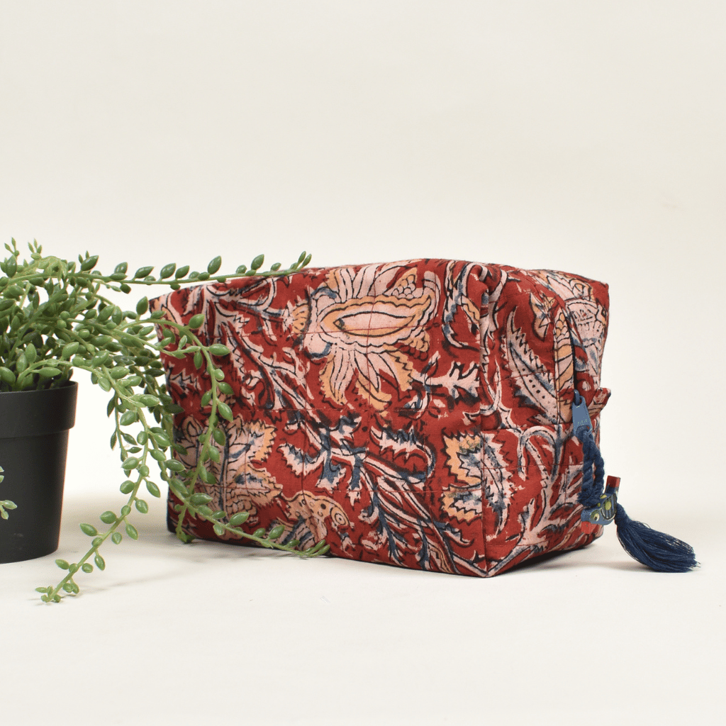 Red kalamkari quilted travel pouch - tassel