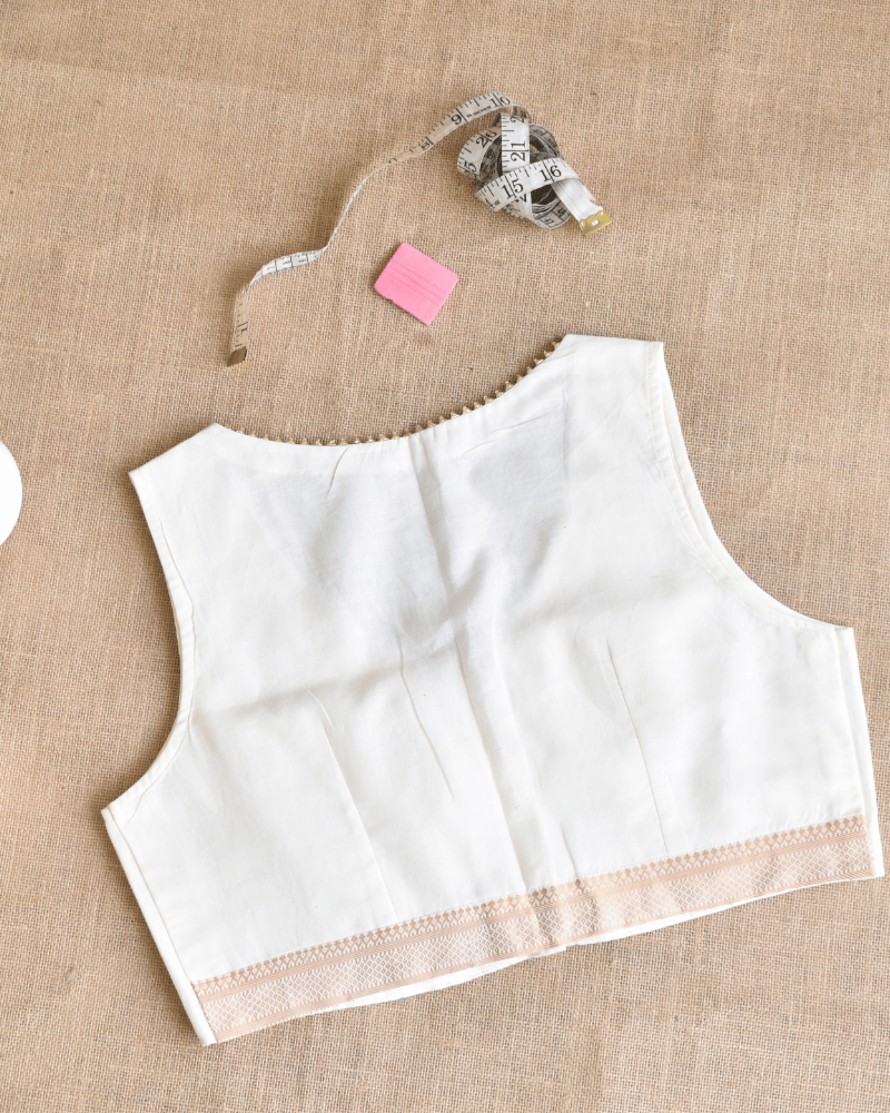 Sleeveless Off-white Blouse with Zari Border