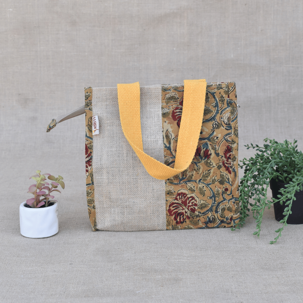 Yellow kalamkari and jute lunch bag
