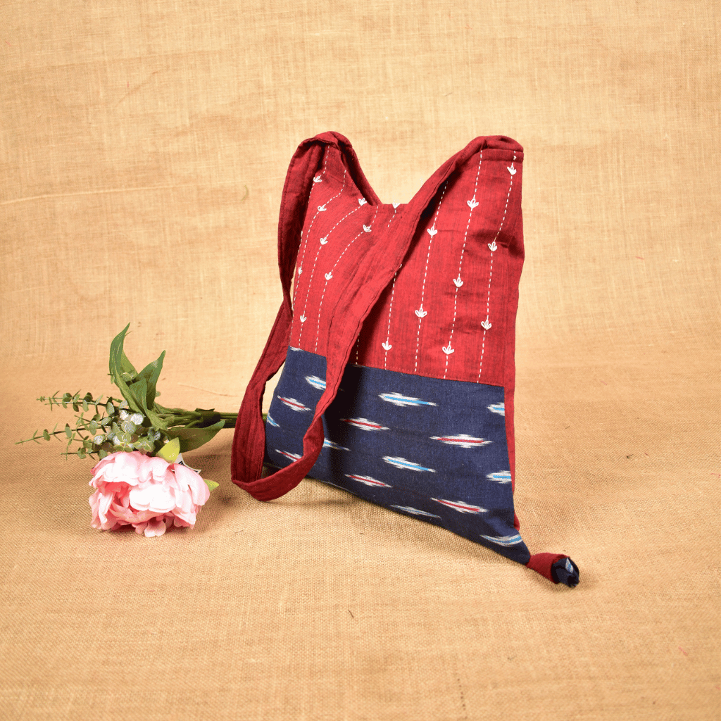 Maroon and Blue Ikat sling bag with hand embroidery - side