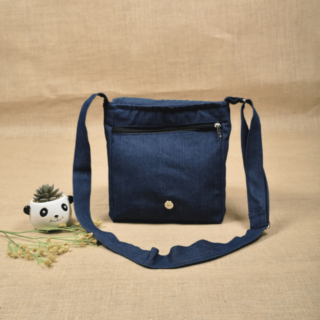 Denim sling bag with embroidery - pockets