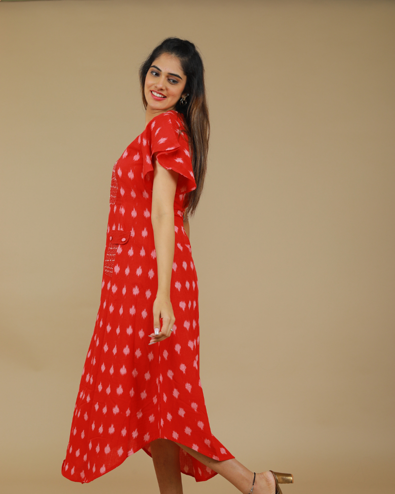 RED IKAT PLEATED DRESS WITH HAND EMBROIDERED POCKETS AND YOKE