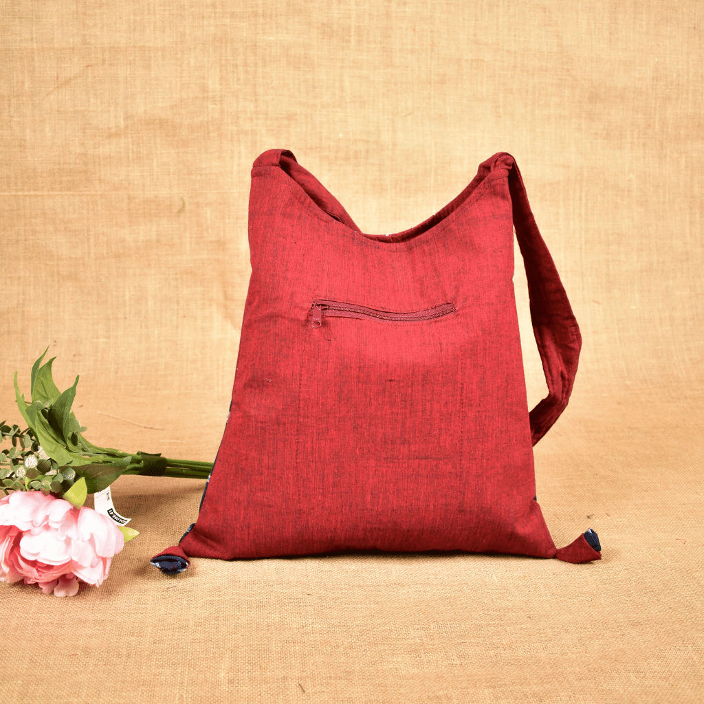 Maroon and Blue Ikat sling bag with hand embroidery - back