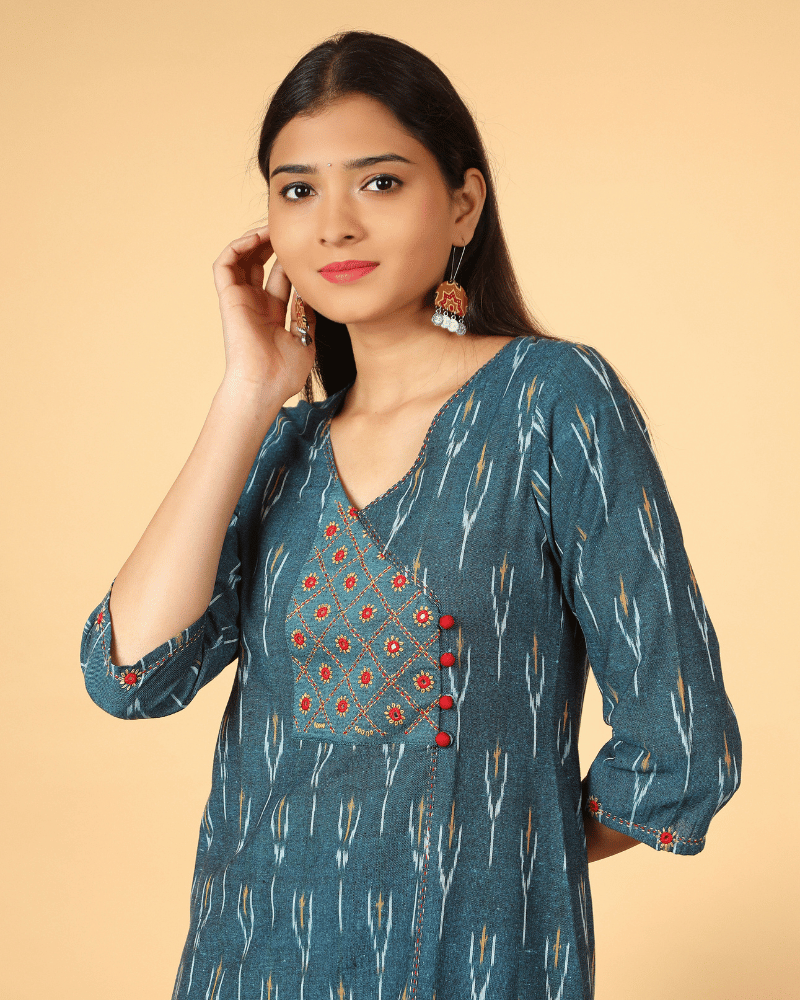 A symmetric Teal Blue Ikat Embroidery Kurta - neck