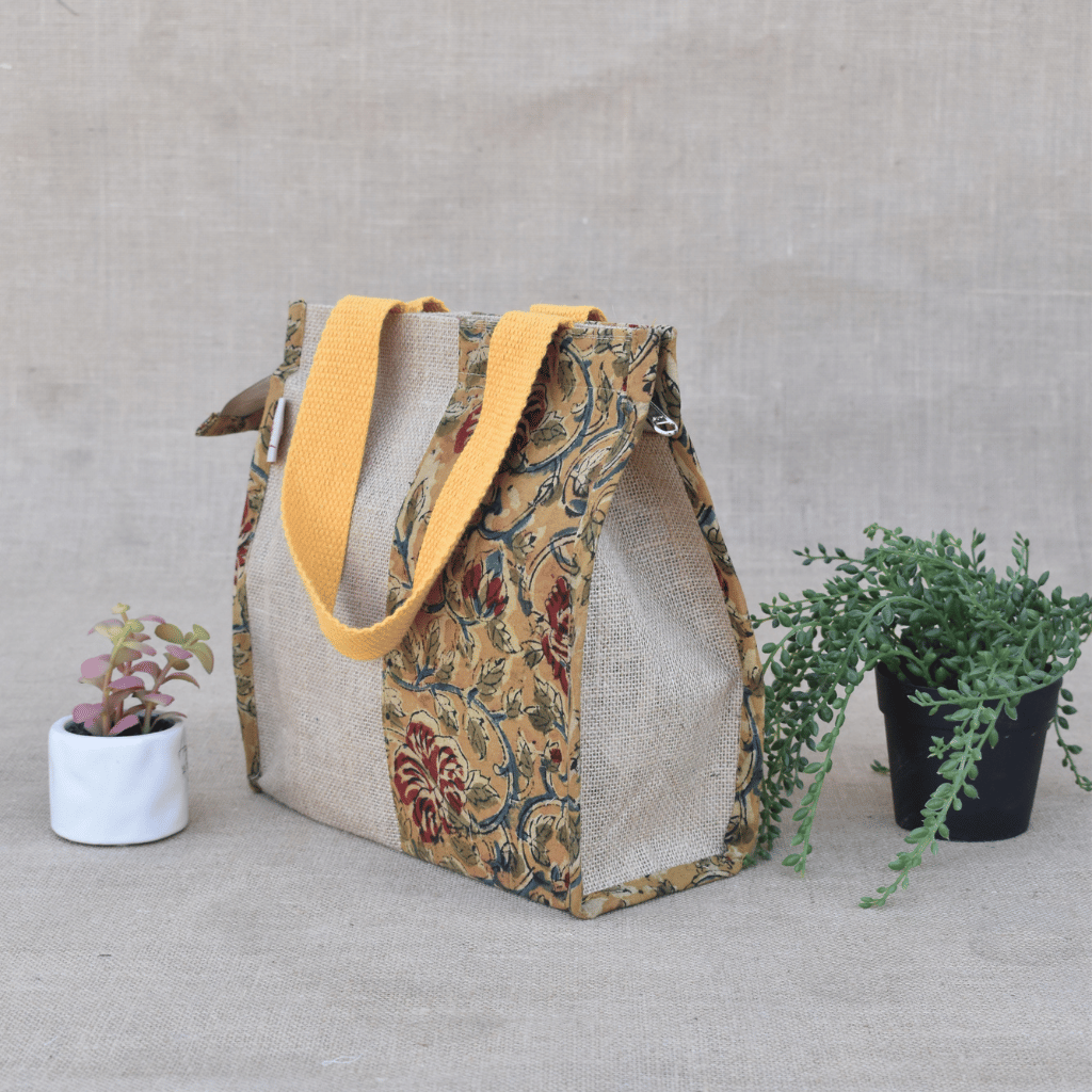 Yellow kalamkari and jute lunch bag