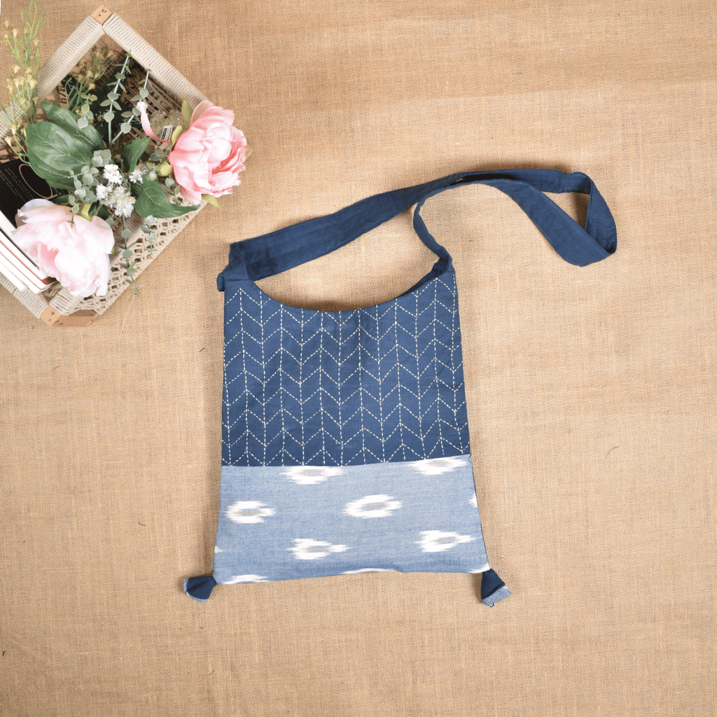 Blue and White Ikat sling bag with hand embroidery - front