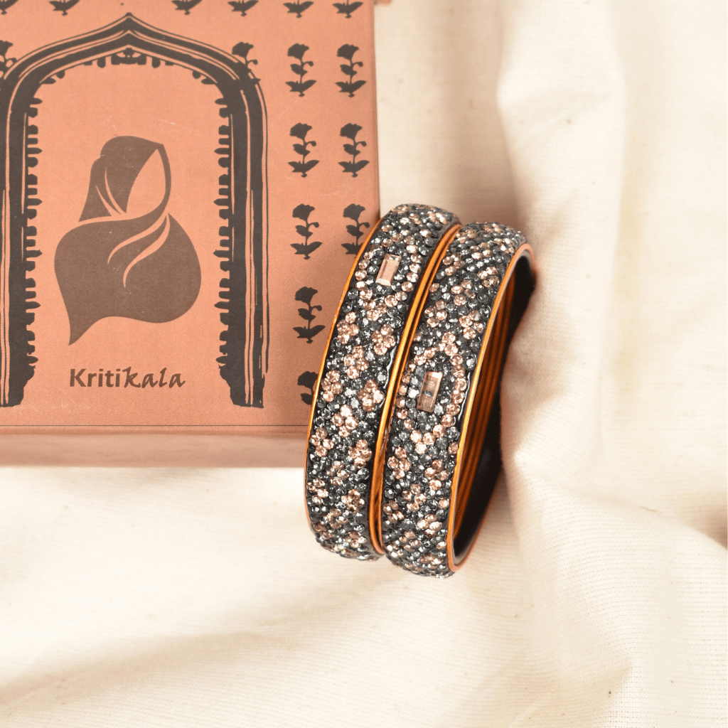 Pair of Black & Gold 5 line stoned lac bangles - Hyderabad