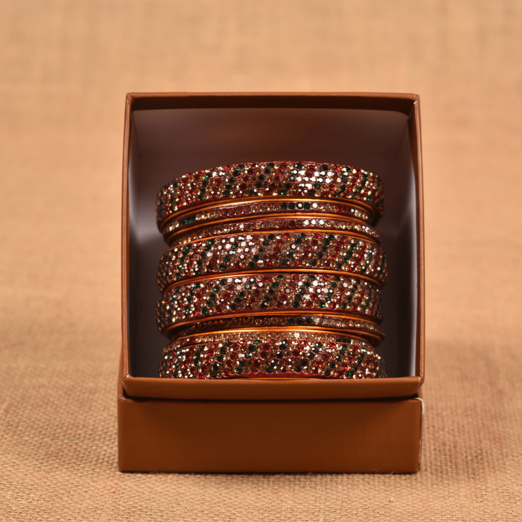 Set of eight bangles in green & red tones