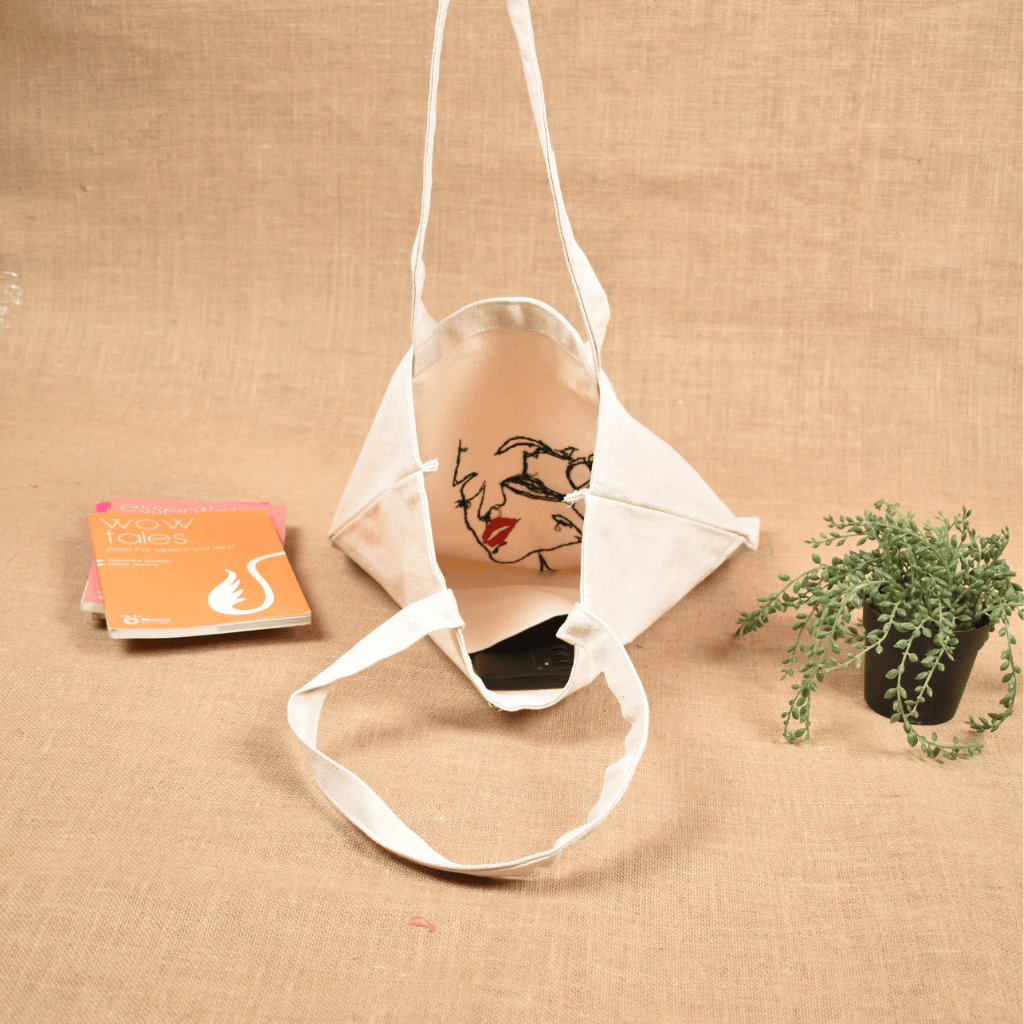 White Canvas Tote Bag with Embroidered Face & Flower Design - inside