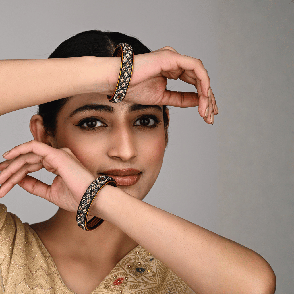 Pair of broad lac bangles in golden and black tones - hyderabad
