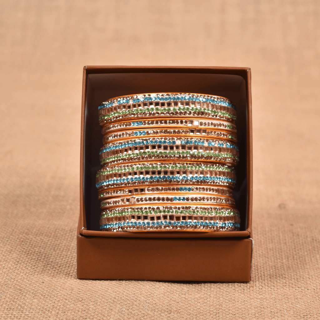 Set of eight bangles in gold & blue tones