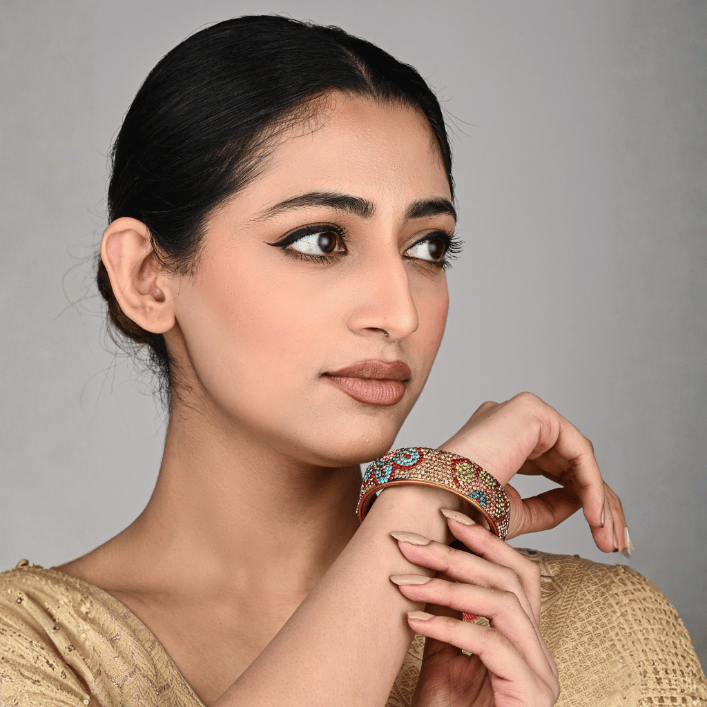 Ethnic gold toned stone studded kada made with lac - Glittery