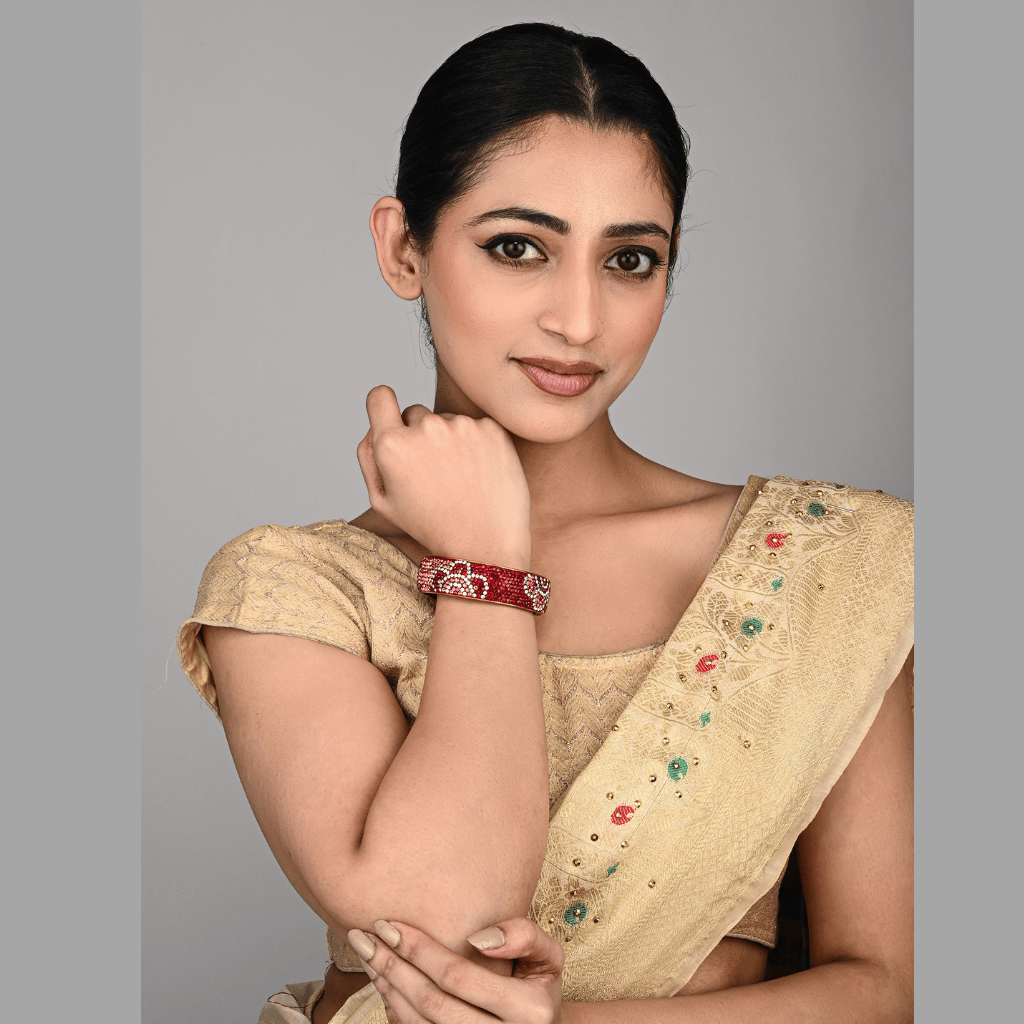 Ethnic maroon toned stone studded kada made with lac - glittery