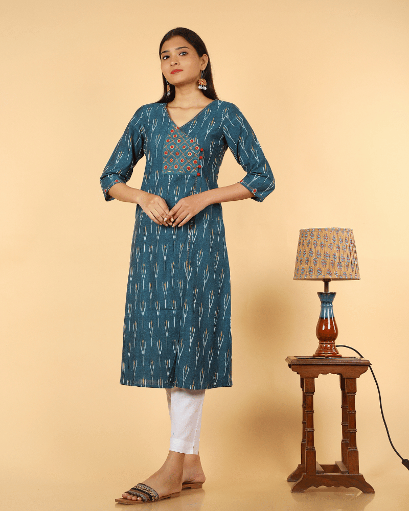 A symmetric Teal Blue Ikat Embroidery Kurta - embroidery