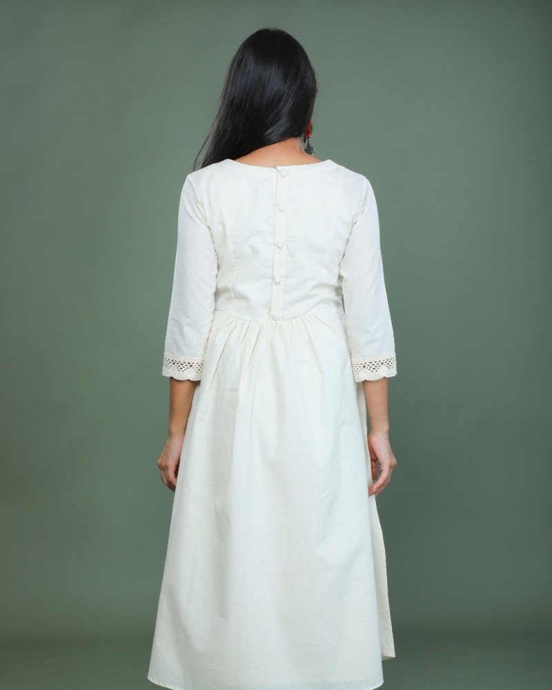 Mirror work dress in off white muslin back view