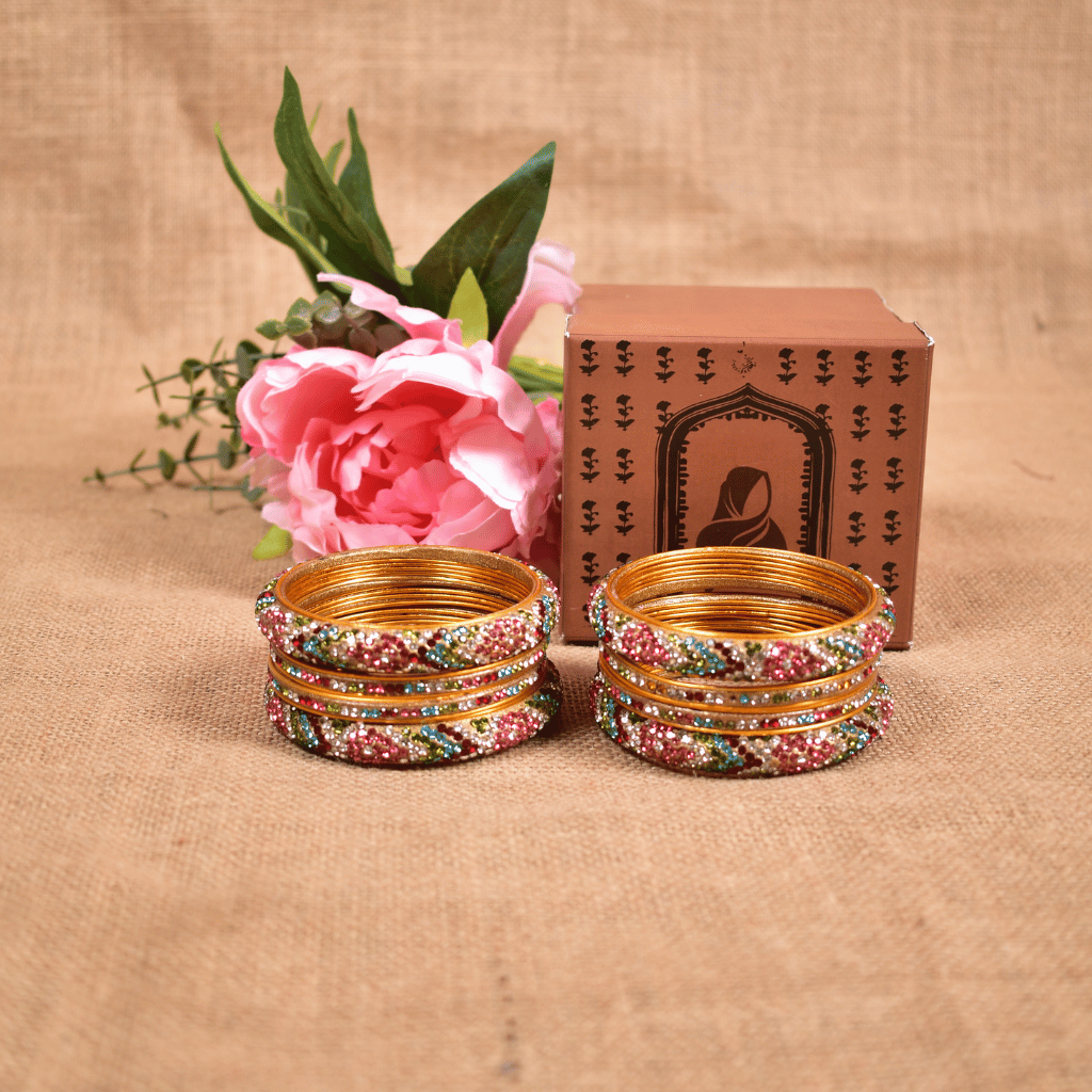 Set of eight bangles in pink & white tones