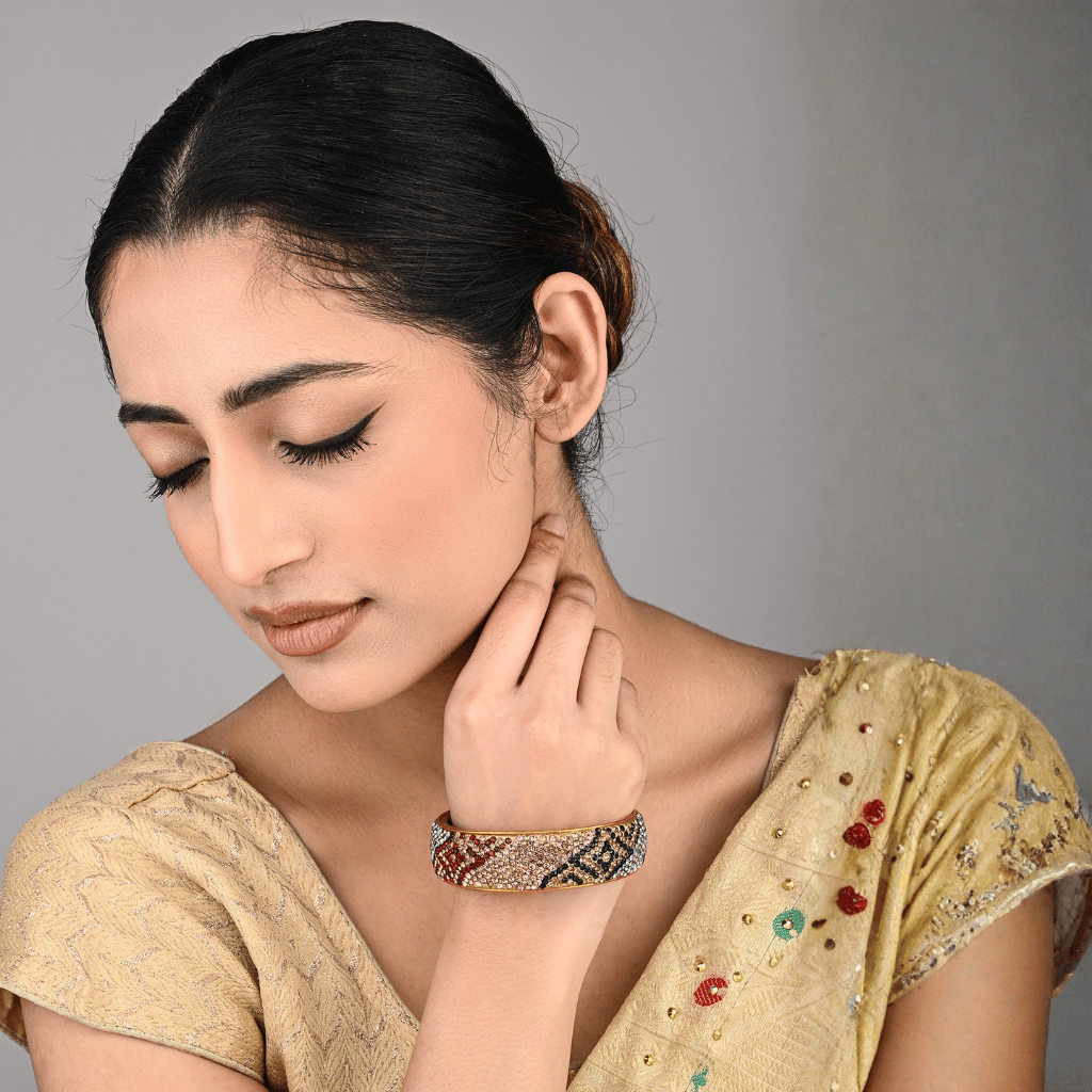 Ethnic gold toned stone studded kada made with lac