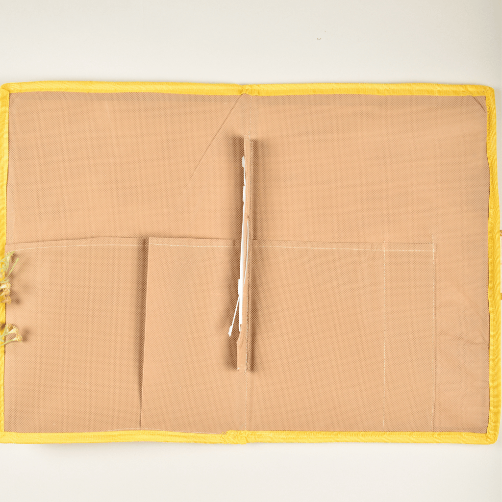 Simple natural jute file folder with a velcro tab and yellow piping - pockets