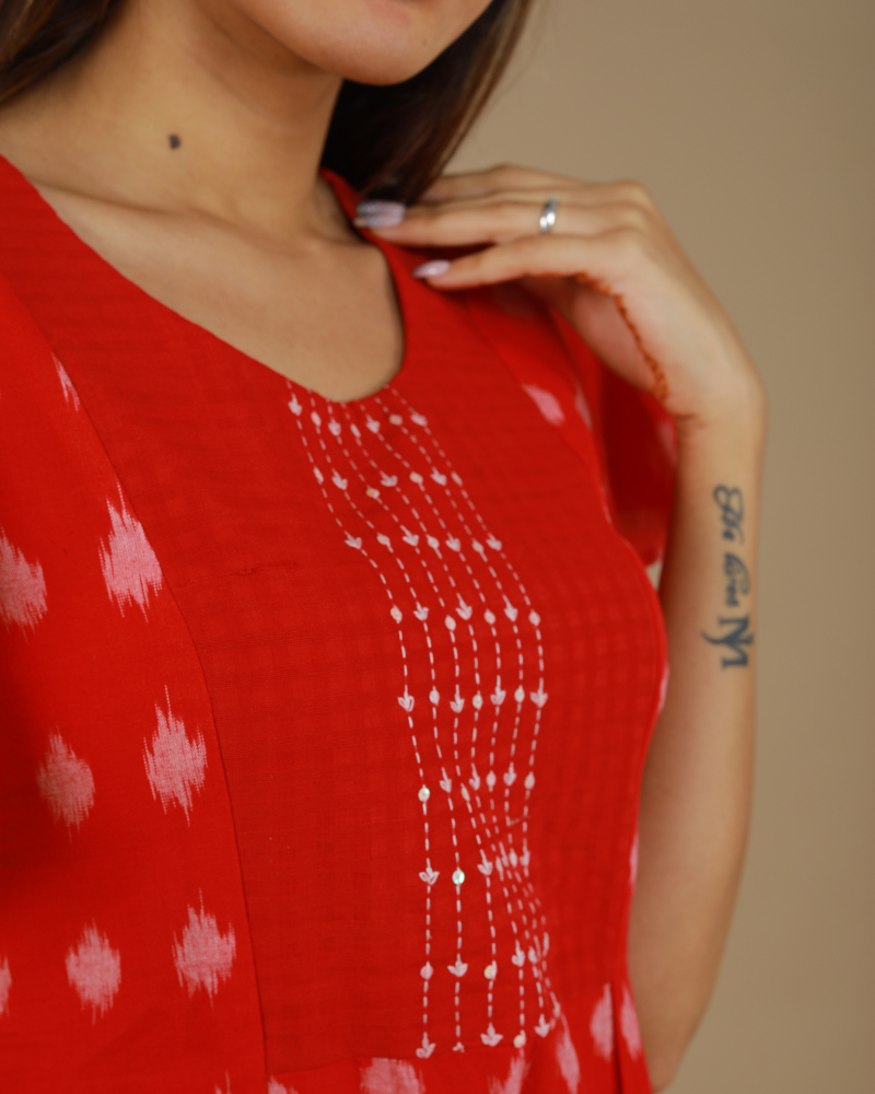 Red ikat pleated dress neck view
