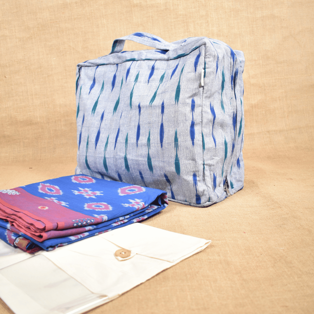 Blue ikat sarees storage bag with sleeves - side