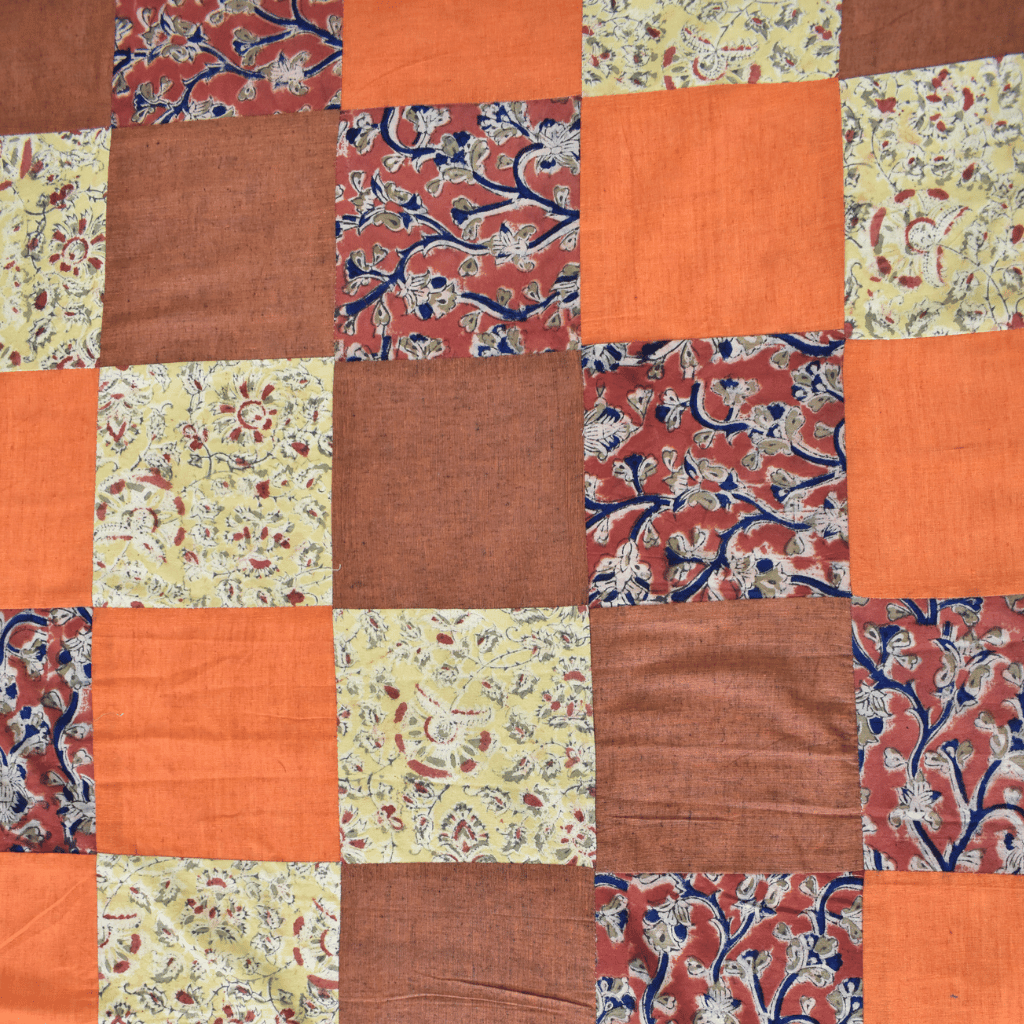 Kalamkari Patchwork Double Bedcover in Rust