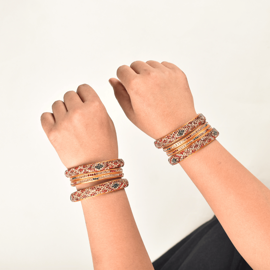 Pair of lac bangles in maroon & gold stones