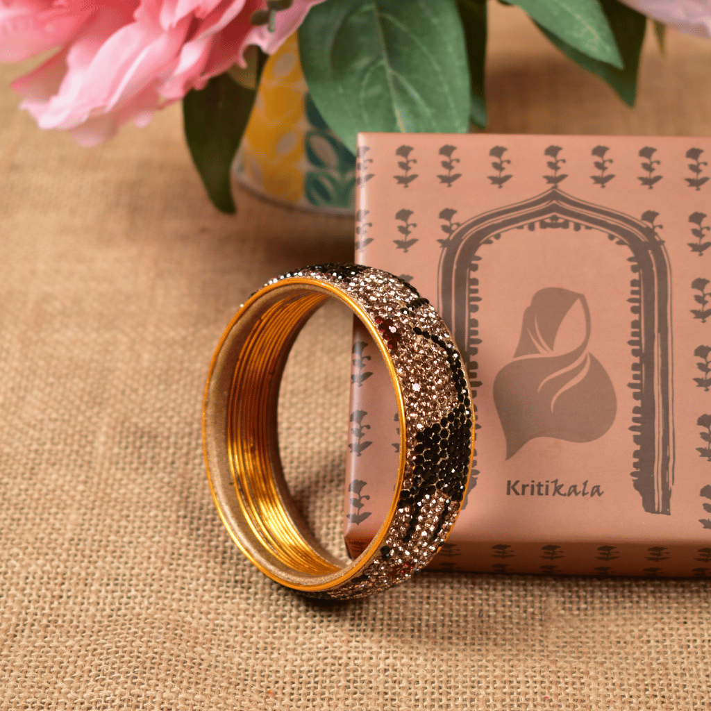 Ethnic Gold toned stone studded kada made with lac - kritikala