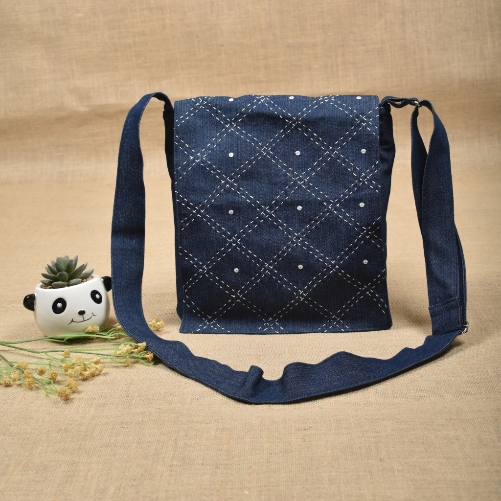 Embroidery denim sling bag - front