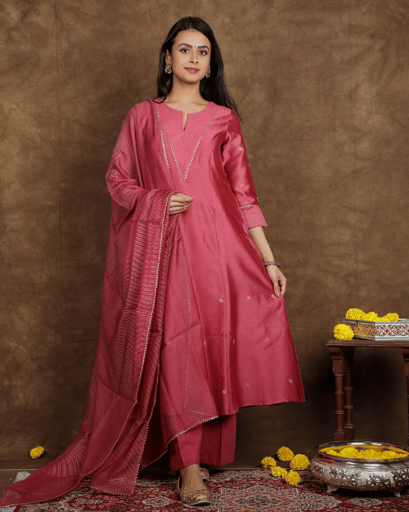 Fida A line Chanderi Silk Kurta and Pant Set with a v shaped yoke and kalis in Onion Pink colour
