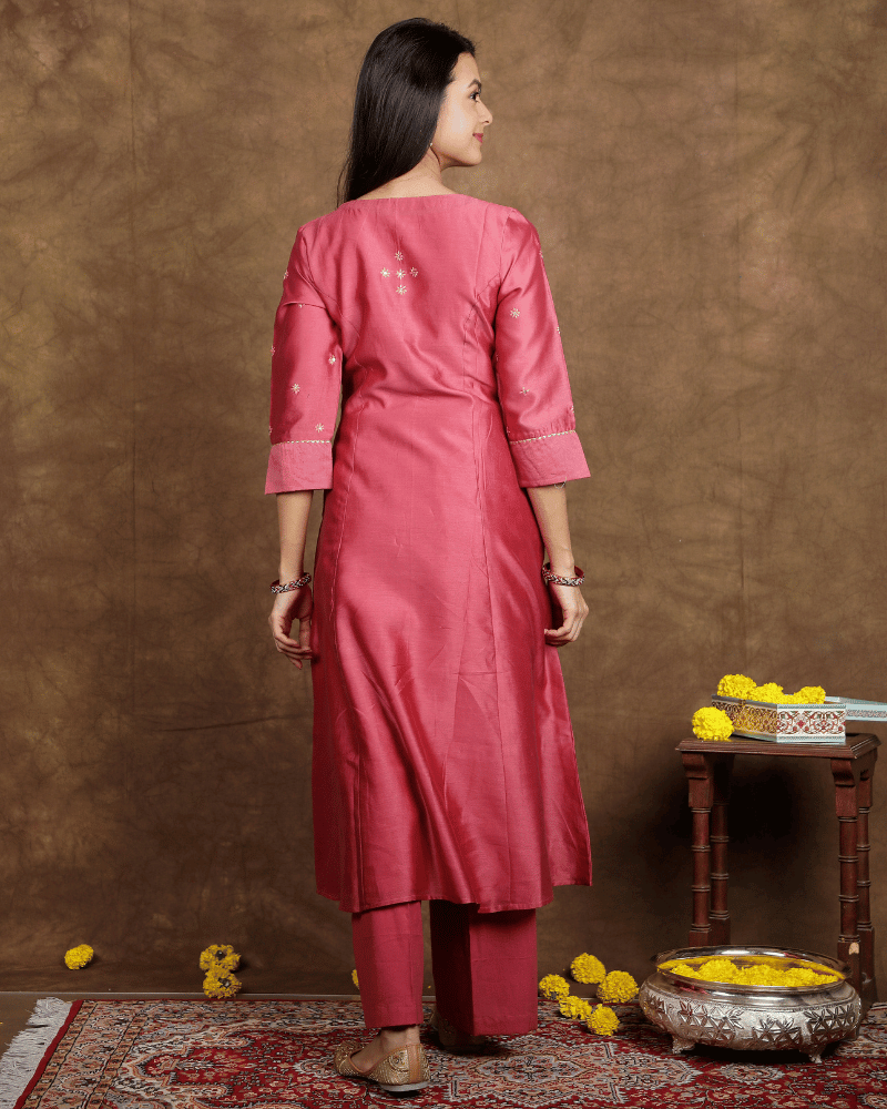 Fida A line Chanderi Silk Kurta and Pant Set with a v shaped yoke and kalis in Onion Pink colour