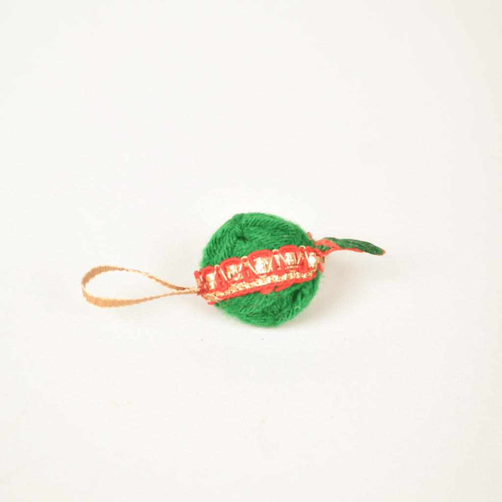 Handmade fabric keychain shaped like a Diwali bomb cracker – festive gift