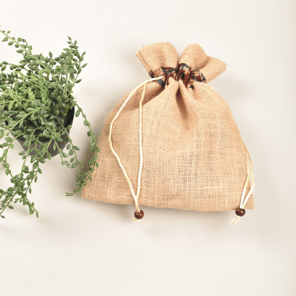 Charming flat jute potli bags in assorted colours