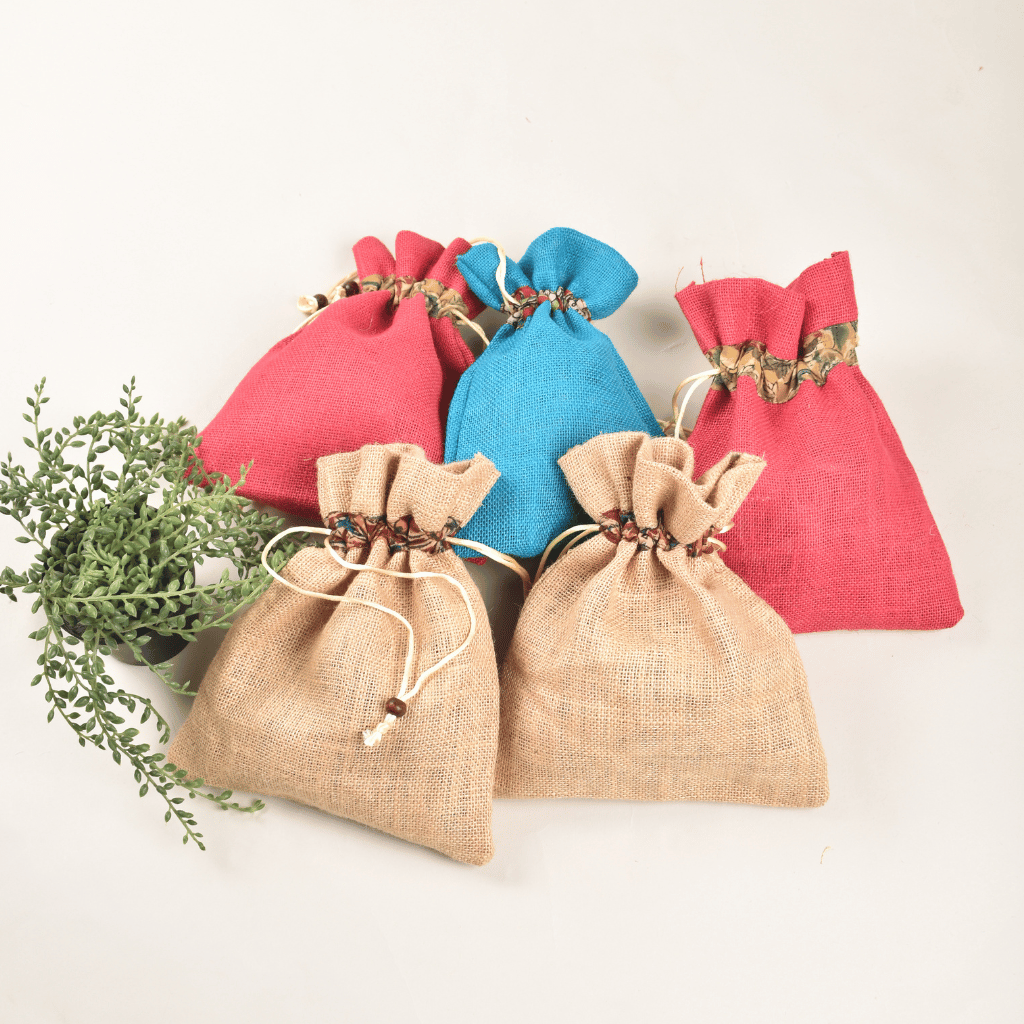 Charming flat jute potli bags in assorted colours