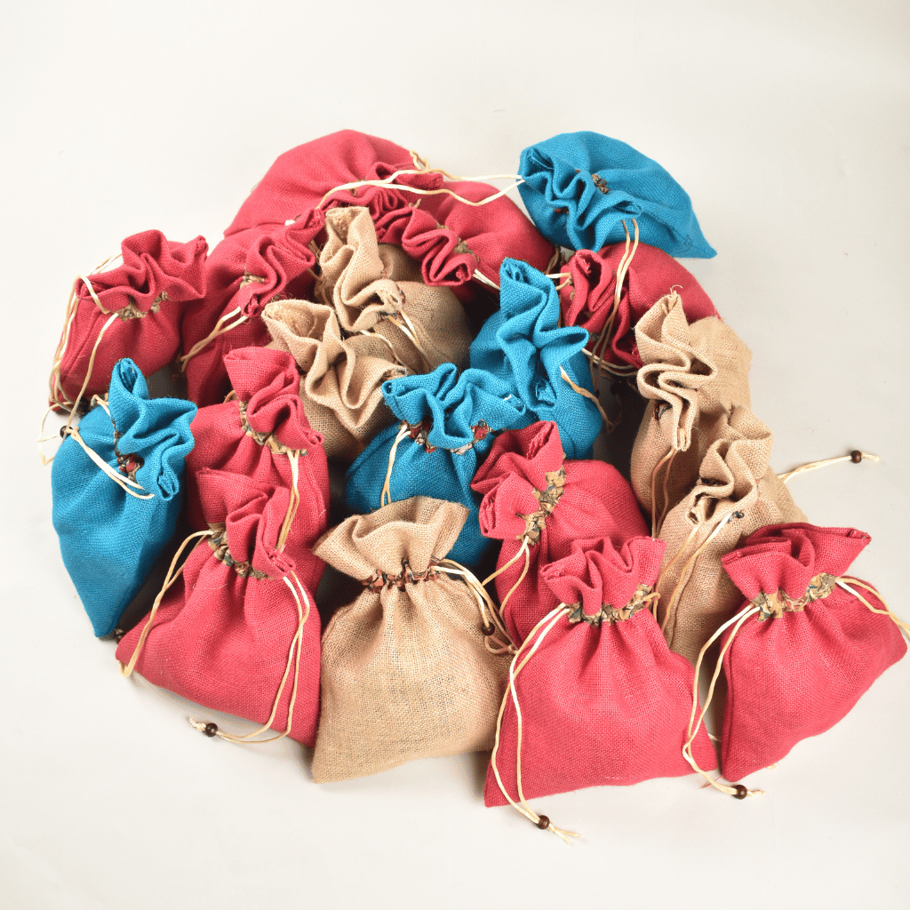 Charming flat jute potli bags in assorted colours