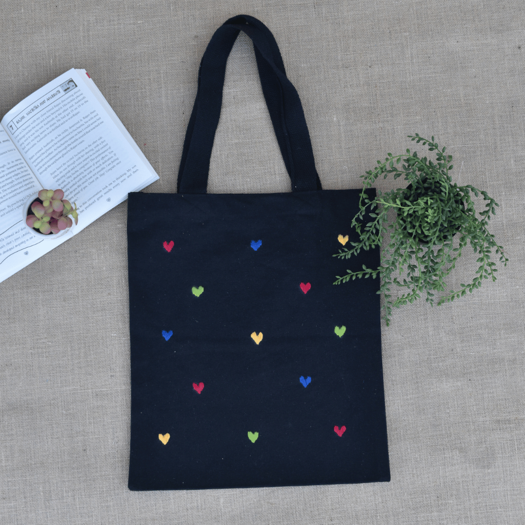 Black canvas tote bag - hearts embroidery - front